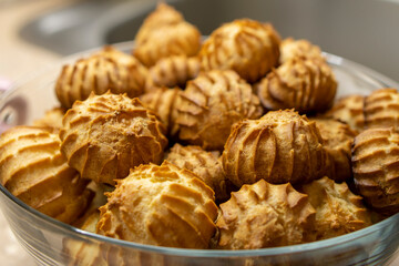 The Making of mini vanilla eclairs.Dessert, profiteroles. Food concept