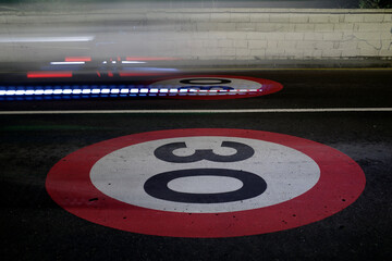 Speed limit signal drawn on the road