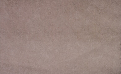 A light tan fabric with a pattern of squares