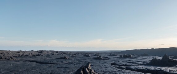 Fototapeta premium Cinematic view of rugged lava fields with black rock formations under a clear blue sky.