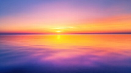 Obraz premium Serene Sunset over Calm Ocean: A Vibrant Display of Colors