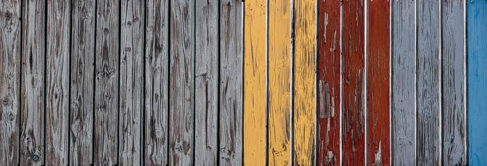 Wide Rustic Blue, Red and Yellow Painted Wooden panels with Varied Pastel Colors and Weathered...