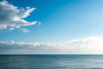 冬の青空と美しい青い海の浜の宮海岸【福岡県築上郡】

