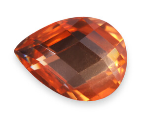 One orange shiny gemstone isolated on white