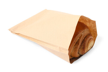 Paper bag with freshly baked bun isolated on white