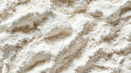 Close-up of a textured white powder resembling flour or sugar.