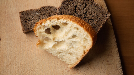 Freshly baked bread on a wooden cutting board