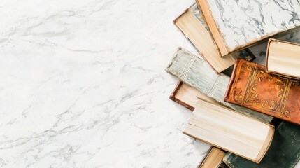Fototapeta premium Stacked Books on Marble and Wood Office Desk with Workspace Background