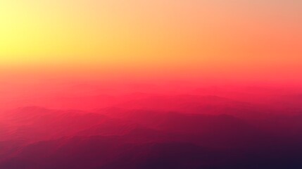 Obraz premium Sunset Hues: A mesmerizing gradient of vibrant yellow, orange, and pink hues paints the sky at sunset, capturing the ethereal beauty of the golden hour.