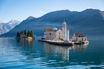 Fototapeta premium Saint George Island and Church of Our Lady of the Rocks near Perast in Montenegro. Boka Kotor bay, Europe. 