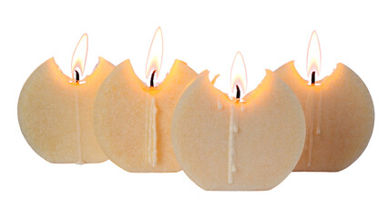 four burning candles isolated over white background