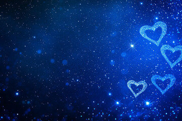 Beautiful blue glittering hearts float against a starry night sky creating a dreamy atmosphere