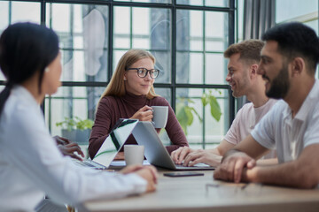 Fototapeta premium Multiethnic group of confident business people in a meeting