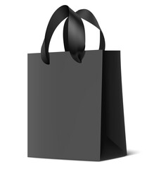 Decorative realistic ecological black paper bag mockup with black silk ribbon handles for shopping isolated on white with shadow. Vector stock illustration.	