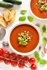 Gazpacho soup in white bowl