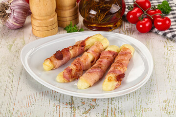 Hot mozzarella sticks with bacon