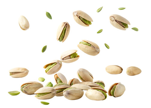 Falling pistachio nuts isolated on a white background PNG.AI GENERATED