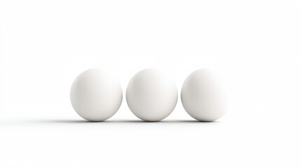 three eggs are lined up in a row on a white background