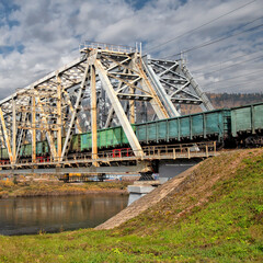 Train traffic. Railroad and trains with wagons. Transportation industry	
