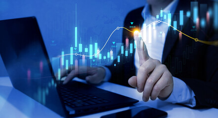 Businessman analysing economic growth graph financial data. Stock market investment. Financial and banking Technology. Business strategy and digital marketing concept.	
