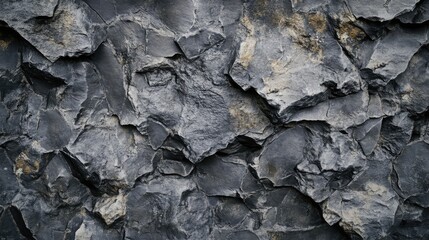 Fototapeta premium Grey stone tabby facade textured background for design inspiration showcasing natural outdoor wall decoration in a rustic style
