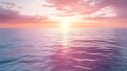 Obraz premium Serene Sunset Seascape: The sun dips below the horizon, painting the sky with vibrant hues of pink and orange, reflecting on the calm, rippling ocean waters in a breathtaking and serene scene. 