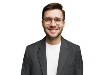 Smiling man in a suit with glasses against a plain background showing confidence and professionalism