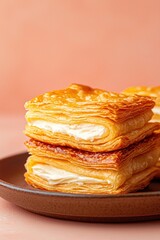 Delightful Milojas Mexican pastry with layers of cream and crispy texture on a smooth plate