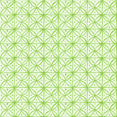 Fototapeta premium Abstract geometric pattern of green shapes on a white background, showcasing creativity in design and symmetry in art