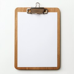 Polished wooden clipboard with blank sheet ready for notes at a workspace or classroom in natural lighting