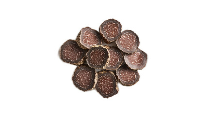 Obraz premium Freshly Sliced Black Truffles Displayed on a White Background
