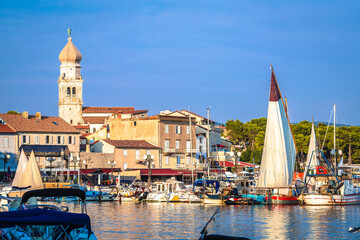 Fototapeta premium Island town of Krk waterfront sails view