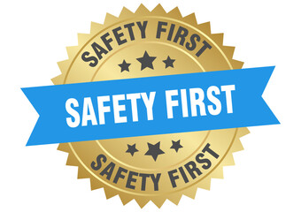 safety first. safety first round blue and gold label isolated on transparent background