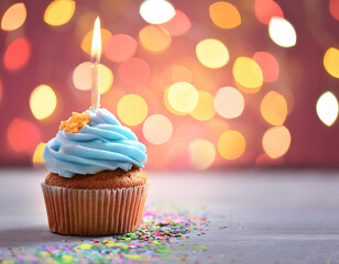 Tasty cupcake with candle on blurred background