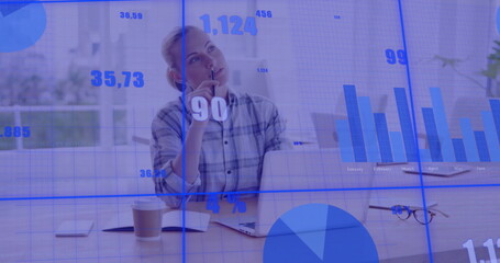 Image of scope and data processing over caucasian businesswoman using laptop