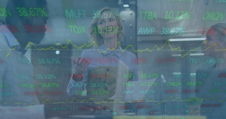 Image of financial data processing over diverse business people in office