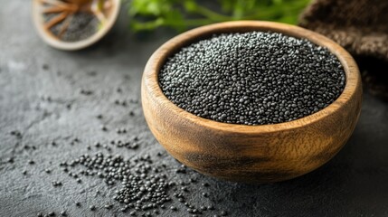 Natural Whole Black Seeds in Brown Bowl