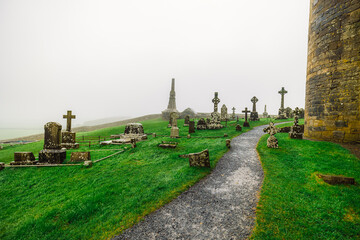 Celtic crosses at Rock of Cashel in Rainy foffy Irish Day , County Tipperary, Ireland