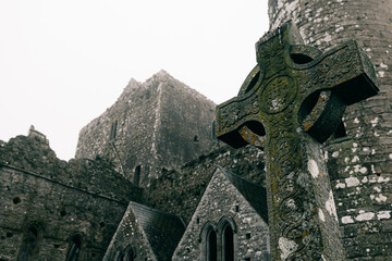 Celtic crosses at Rock of Cashel in Rainy foffy Irish Day , County Tipperary, Ireland
