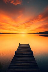 Fototapeta premium A peaceful lakeside sunrise where the light dances on the water and a dock fades into the mist.