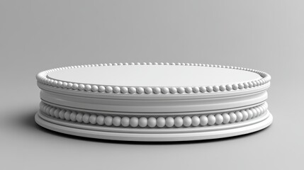 A round, decorative pedestal with a beaded design, suitable for display.