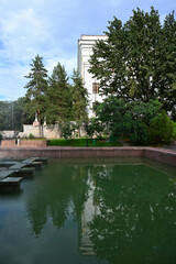 Almaty city buildings on a summer day. Shevchenko street, Academy.
