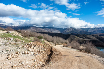 Swirling gravel road at the Gamti mountain near Bovilla lake, Albania