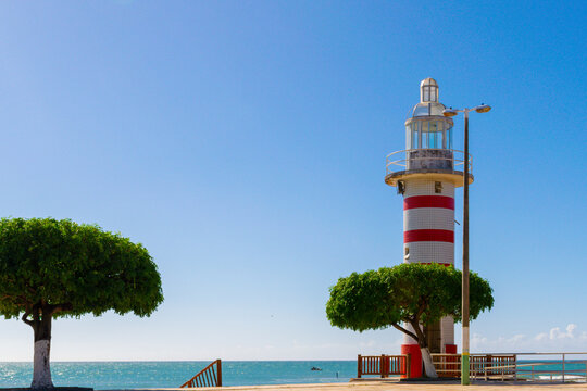 Lighthouse on the Paracuru beach, Ceara, Brazil.
