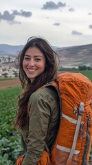 Naklejka premium Adventurous Woman in Nature with Backpack