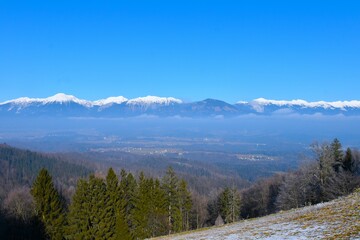 Snow covered mountain peaks in Karavanke mountain range in Gorenjska, Slovenia
