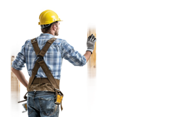Construction worker installing a door frame at a worksite for building tasks Isolated on Transparent background PNG