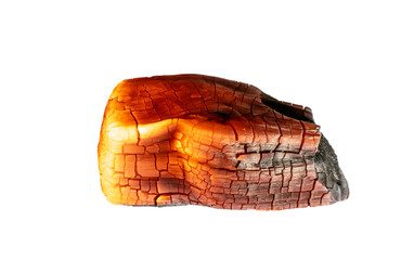 a burning piece of coal on a white background