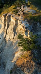 Obraz premium Unique Soft Cliff Formation with Deep Shadows and Curves, Showcasing Natural Beauty and Landscape Variation in a Serene Environment