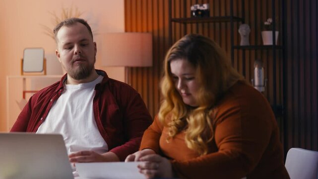 Couple reveals an error in a financial report, feeling distressed over setback